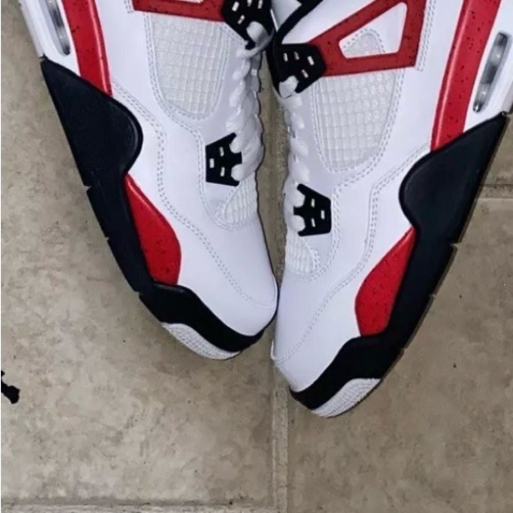 Nike air jordan 4 retro. Red cement size 5 men’s/womens 6 1/2